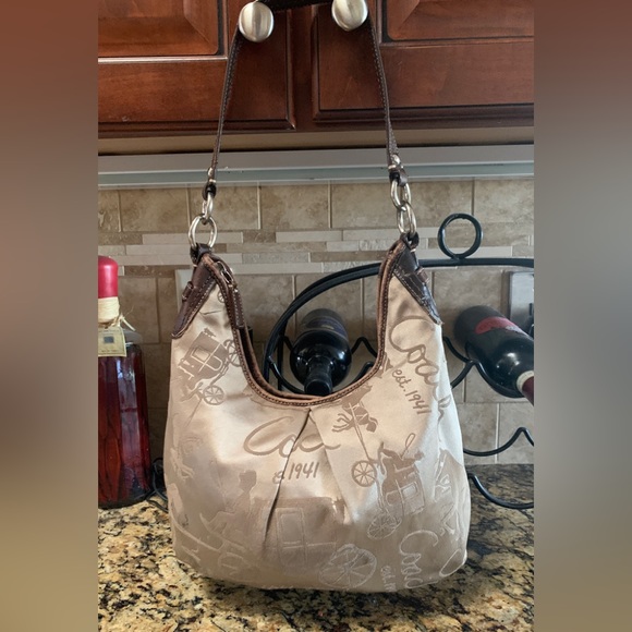 Coach Handbags - Coach Tan Embossed Fabric Shoulderbag